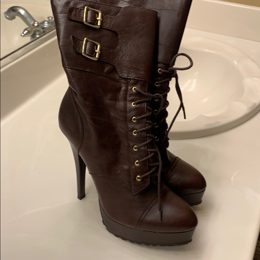 Women’s Bebe brown boots with buckles. Brand new